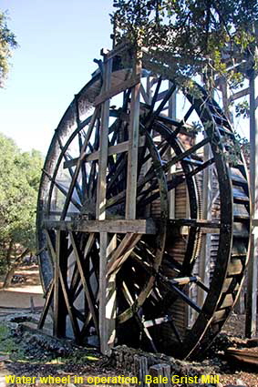 Water wheel in operation, Bale Grist Mill, St Helena, CA, USA Water wheel in operation, Bale Grist Mill, St Helena, CA, USA